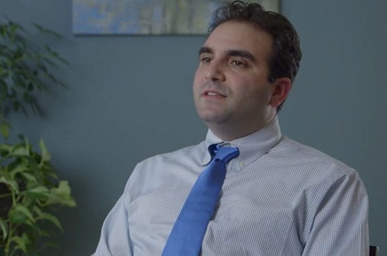 Dr. Sasson speaks to interviewer in video screenshot